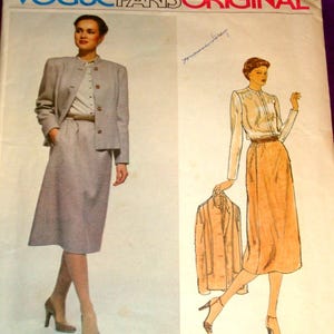 May include: Vogue Paris Original sewing pattern featuring a skirt suit and a blouse with a skirt design. The pattern includes a jacket, skirt, and blouse. The text "Vogue Paris Original" and "Pierre Balmain" are visible.