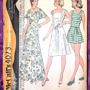 May include: A McCall's 4073 sewing pattern envelope for a half size dress or playdress and shorts. The illustration shows three variations: a floor-length floral dress, a knee-length dress with a tie waist, and a short dress with shorts.