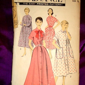 May include: An Advance 8230 sewing pattern envelope featuring illustrations of four different dress styles. The designs include a solid pink button-front dress with a bow, a floral print dress, a polka dot dress, and a quilted-style patterned coat.