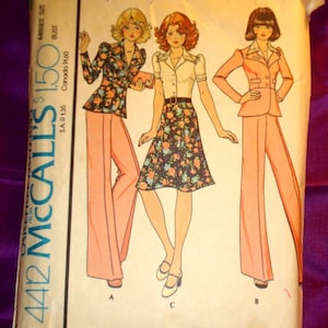 May include: A vintage McCall's sewing pattern with illustrations of women's clothing. The pattern includes designs for an unlined jacket, trousers, and a skirt. The cover art displays three different outfits in various colours and floral patterns.