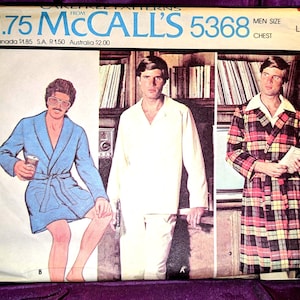 May include: Vintage McCall's 5368 sewing pattern for men's robes and pajamas. The pattern cover features illustrations of men in robes and pajamas. The text on the cover includes "MEN SIZE LARGE CHEST" and "MEN'S ROBE AND PAJAMAS".