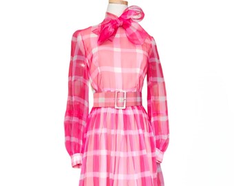 1960s Pink Plaid Dress with Bow at Neck. Sheer Chiffon Long Sleeve Dress with Belt. Pussybow Neck Shirtwaist Dress. Size Small, 36" Bust.