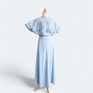 chiffon capelet dress vintage Cape Pastel 50s women's Color:Show As Picture color:dasa-mini-dress-flk-mini-leoprd-plm-202 swatch:https://www.motelrocks.com/cdn/shop/files/DASA-MINI-DRESS-FLK-MINI-LEOPRD-PLM-7612D.jpg?v=1759997182&width=100 Striped V-Neck Button-Front Maxi Sleeveless slipover style with