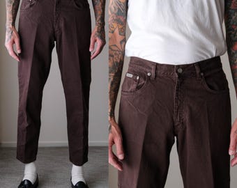 Vintage 90s CALVIN KLEIN Chocolate Brown Leather Patch Jeans | Made in USA | Size 33 x 30 | 100% Cotton | 1990s Designer Unisex Denim Pants