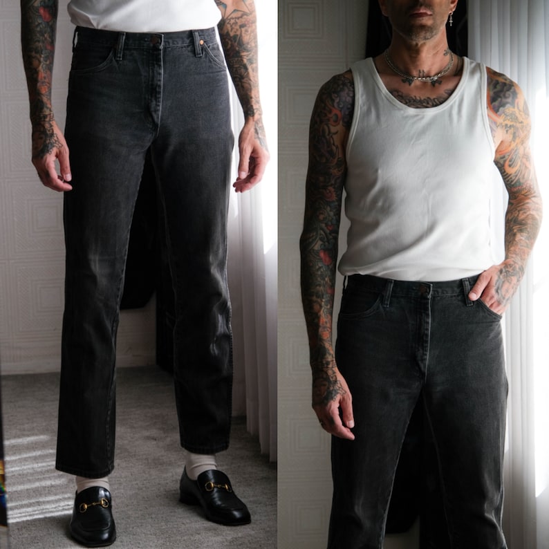 May include: Two photos of a person wearing black jeans and a white tank top. The person in the first photo is wearing a white t-shirt and black loafers. The person in the second photo is wearing a white tank top and has tattoos on their arms.