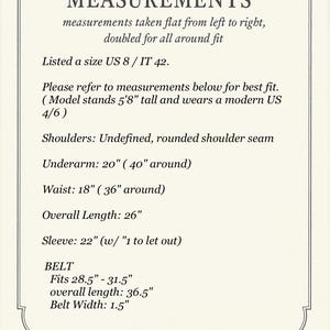 May include: Cream-colored card with black text detailing garment measurements. Includes shoulder, underarm (20 inches), waist (18 inches), overall length (26 inches), and sleeve (22 inches) measurements. Also lists belt measurements.