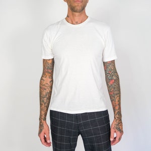 Vintage 70s HANES Blank White Single Stitch Tee | Made in USA | 1970s Distressed Paper Thin, Marbled, Cap Sleeve Greaser, Rocker T-Shirt