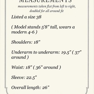 Peut inclure: Carte cr&egrave;me avec texte noir indiquant les mesures d'un v&ecirc;tement. Comprend la taille 38, largeur d'&eacute;paule 45.7 cm, aisselle &agrave; aisselle 49.5 cm (94 cm de tour), taille 45.7 cm (91.4 cm de tour), longueur de manche 57.2 cm et longueur totale 66 cm.