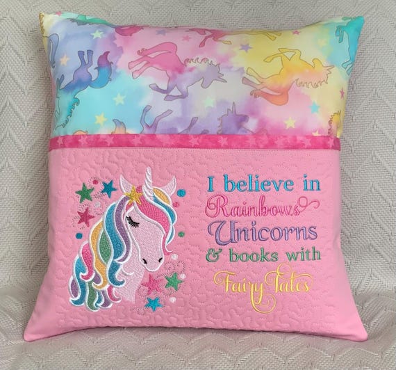 Unicorn Reading book cushion cover/Unicorn , stars on a colourful background.
