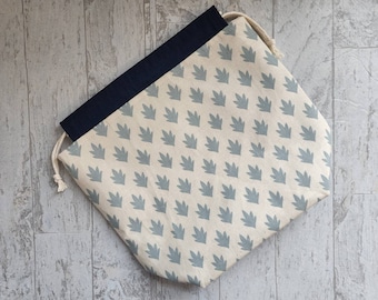 Medium project bag for knitting, crochet, needlework;  Subtle slate blue leaves on cream drawstring pouch with pockets