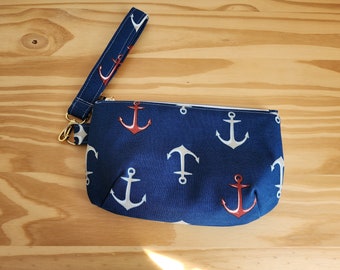 Anchors clutch with detachable wrist strap