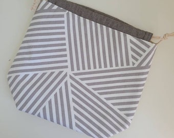 Medium angles project bag for knitting, crochet, needlework; Gray lines drawstring pouch with pockets