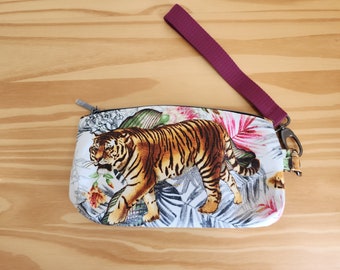 Tiger clutch with clip on wrist strap; wristlet with inner slip pocket