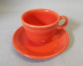 Post 86 quot NEW quot Fiesta Cup Saucer set Persimmon retired Homer Laughlin China 2000 made in USA coffee tea red orange