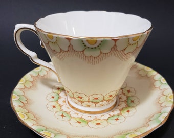 Glassstone china,  Porcelain Saucer and Cup, Made in England, yellow and green flower