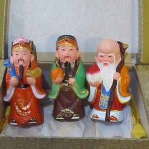 Vintage red clay hand painted Boxed Asian Gods that represent health and longevity.
