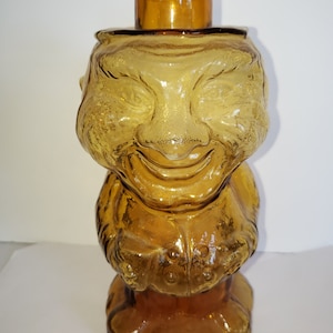 Antique Amber Lidded Toby Glass Decanter Whiskey Bottle with its cup or stopper.