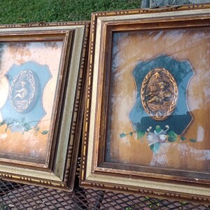 Wall art frame artwork, three dimensional pair of Victorian figures chrubs on a Plaque.