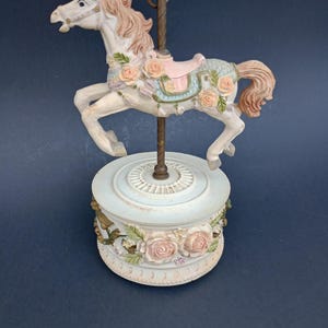 Resin carousel music box