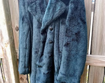 Emerald green coat in the style of Alexander McQueen, international coat..