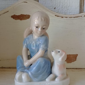 Blue Glazed Porcelain Girl and Dog Figurine