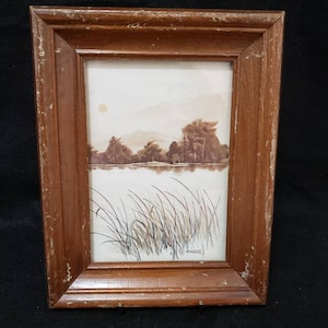 Wall art, frame art, Artist Fimassa landscape river scene earthtone color old print with frame. Lagoon scene, port scene, swamp scene