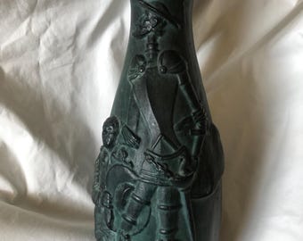 A large Classic Style Continental pottery vase with raised decoration of Don Quixote