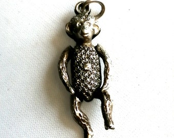 Antique silver monkey charm, moving articulated pendant c1900s