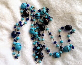 Blue glass end of day beaded necklace, vintage Art Deco 40 inches