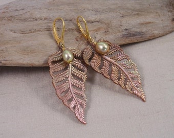 Tropical luxury in earrings of iridescent, hand-carved oyster shell, freshwater pearl & 22k and 24k vermeil