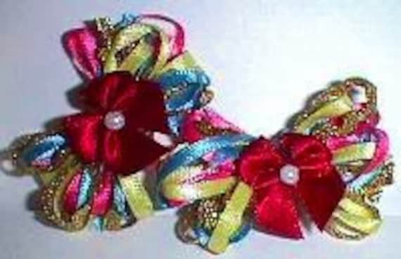 Puppy Bows ~ Wild and flirty dog grooming bows for any long haired dog. Barrettes attached.
