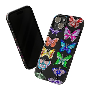 May include: Black phone case with a colorful butterfly pattern. The case has a camera lens cutout and a black background.