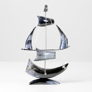 Vintage sailing ship horn sculpture