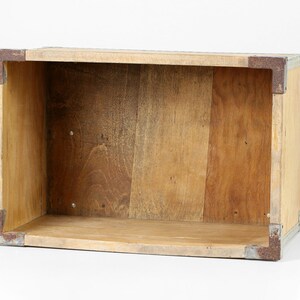May include: A wooden storage box with metal accents. The box is empty and has a natural wood finish.
