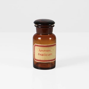 Frasco de boticario vintage: tarro de cristal con tapa, etiqueta roja, decoración de farmacia de los años 60