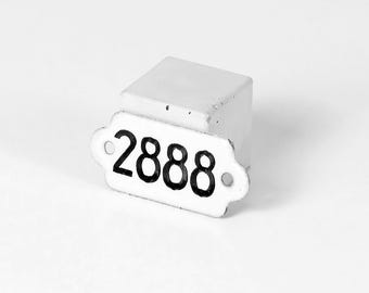 May include: White metal tag with black painted number 2888.