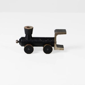 Vintage bronzen kandelaar locomotief ontwerp uit het midden van de eeuw