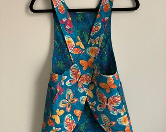 Butterflies and flowers, Child's M (6-8), cross back apron/pinafore, fully lined