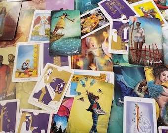 May include: A collection of tarot cards featuring colorful illustrations and gold accents. The cards include the Fool, Temperance, Knight of Pentacles, Ten of Pentacles, 9 of Wands, and Ace of Wands.