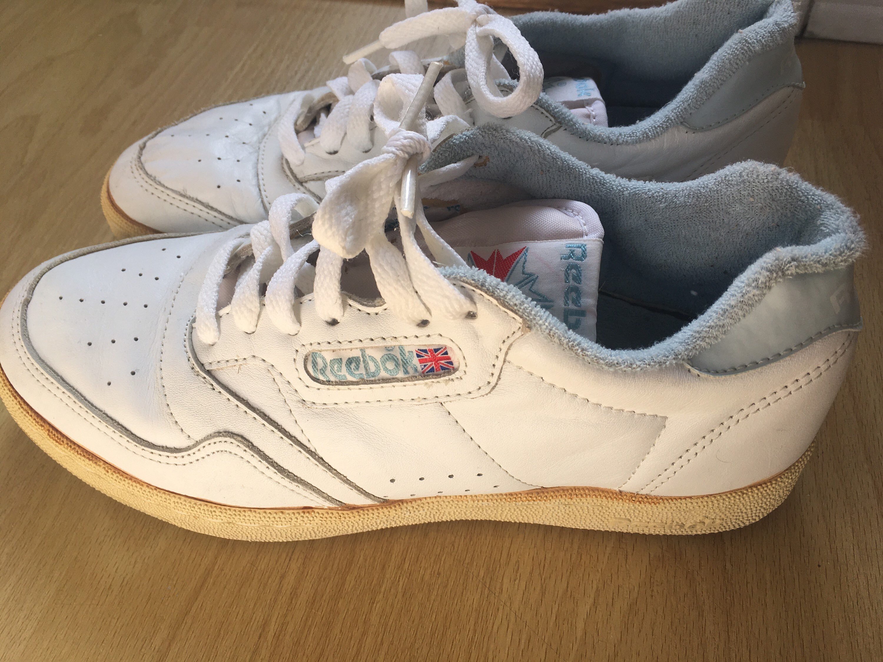 white leather reeboks