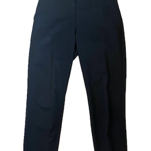 May include: A pair of black trousers with a button closure and pockets. The pants have a straight leg design and are made of a solid, dark fabric. The trousers are suitable for various occasions.