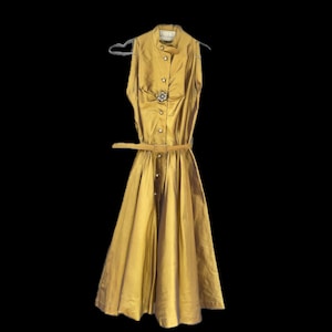 Felix Safian 1950s taffeta cocktail party dress metallic gold sleeveless satin structured fashion buttons wedding bridal belted twirl skirt