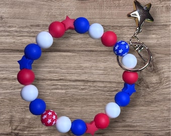 Celebrate America’s 250th in style!  USA Patriotic Beaded Wristlet Keychain – Red, White & Blue Star Design