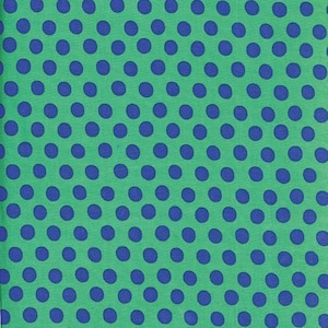 May include: A green fabric with a repeating pattern of blue polka dots.