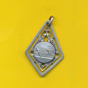 Art Nouveau silver plated charm medal pendant representing Fencing medal 1928 (ref 4631)