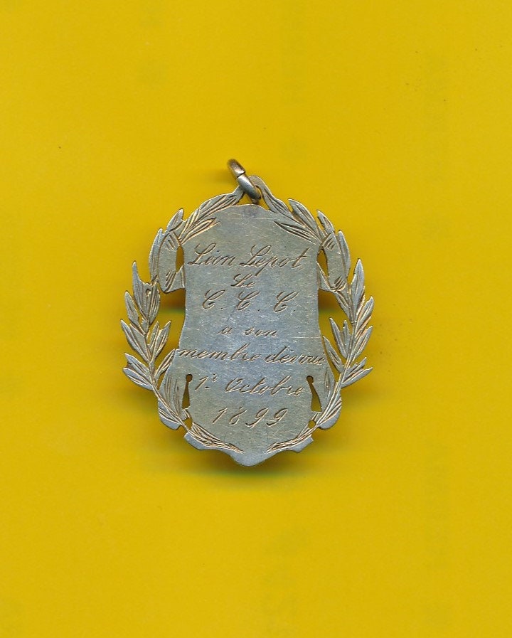 6055# Jolie médaille sportive Cyclisme en bronze argentée