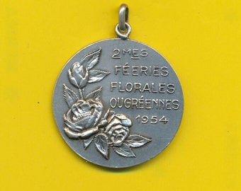 Antieke sterling zilveren bedelmedaillehanger die Bloemen voorstelt - Bloemenbetovering 1954 (ref 4926)