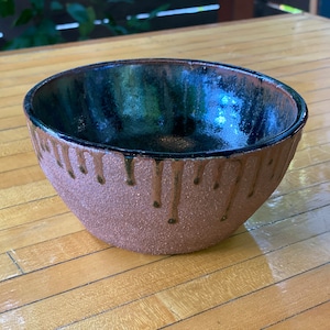 Handmade small ceramic bowl // red clay with black mottled glaze