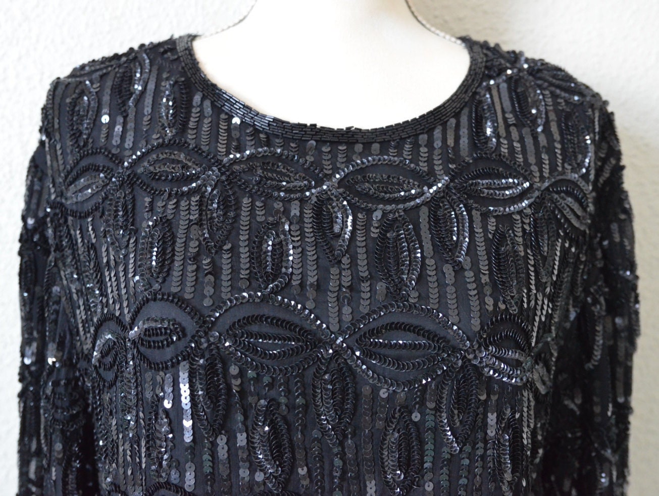 long sleeve black sequin blouse