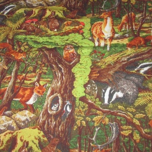 May include: A colourful fabric featuring a woodland scene with a variety of animals, including deer, squirrels, foxes, and badgers. The fabric is brown, green, and yellow with a variety of textures.
